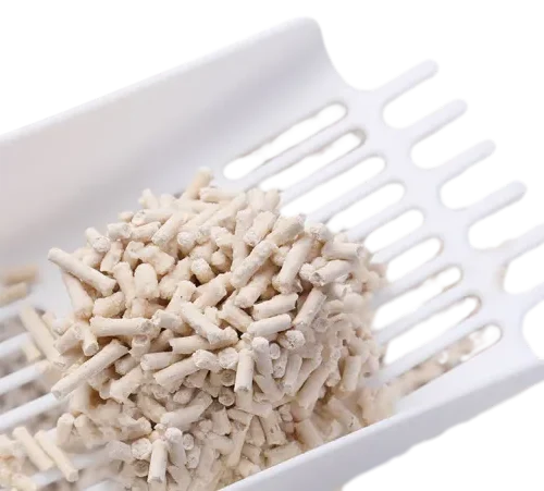 Clumped White Plant Pellet Cat Litter on Scoop by Isemipet