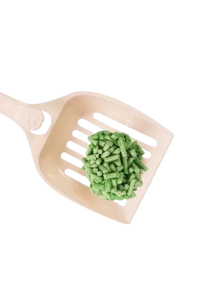 Green Clumping Tofu Cat Litter Pellet On Shovel – Highly Absorbent And Flushable by ISEMIPET